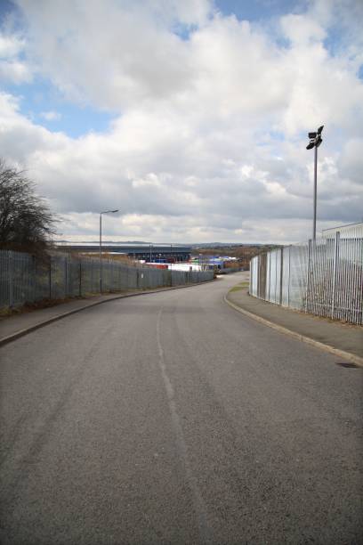 istock Curving road to distribution warehouse 172861559