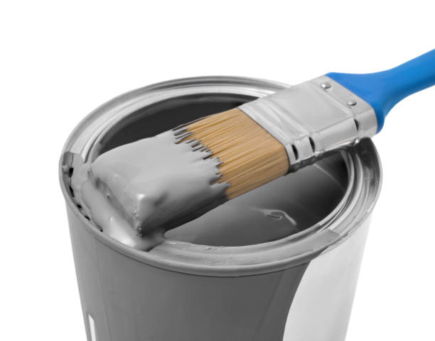 istock Can with grey paint and brush on white background, closeup 1728630089