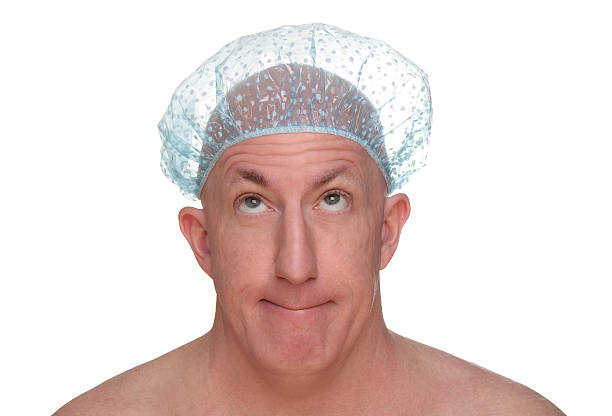 лысый мужчина в душе крышкой - shower cap стоковые фото и изображения