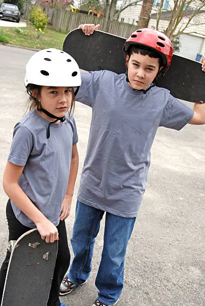"Two skateboard kids, hispanic brother and sister.Additional images with these models: http://www.istockphoto.com/file_search.phpaction=file&amp;lightboxID=2605553"