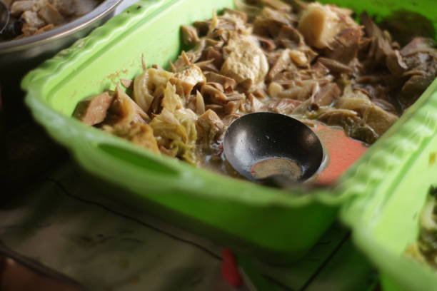 istock Selective focus sayur lodeh nangka (young jackfruit vegetable) served in a pan. 1728649362