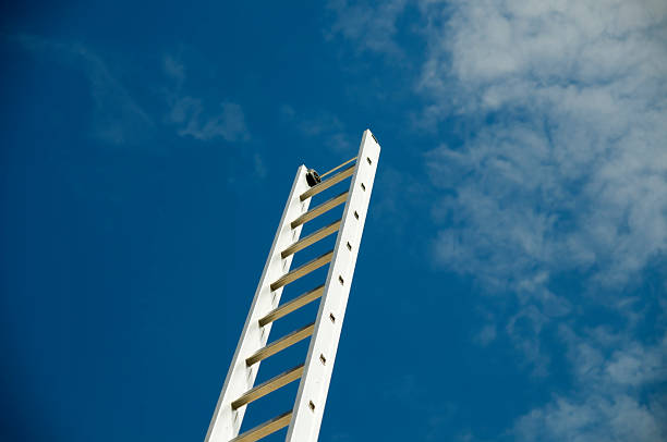Ladder on a blue sky background