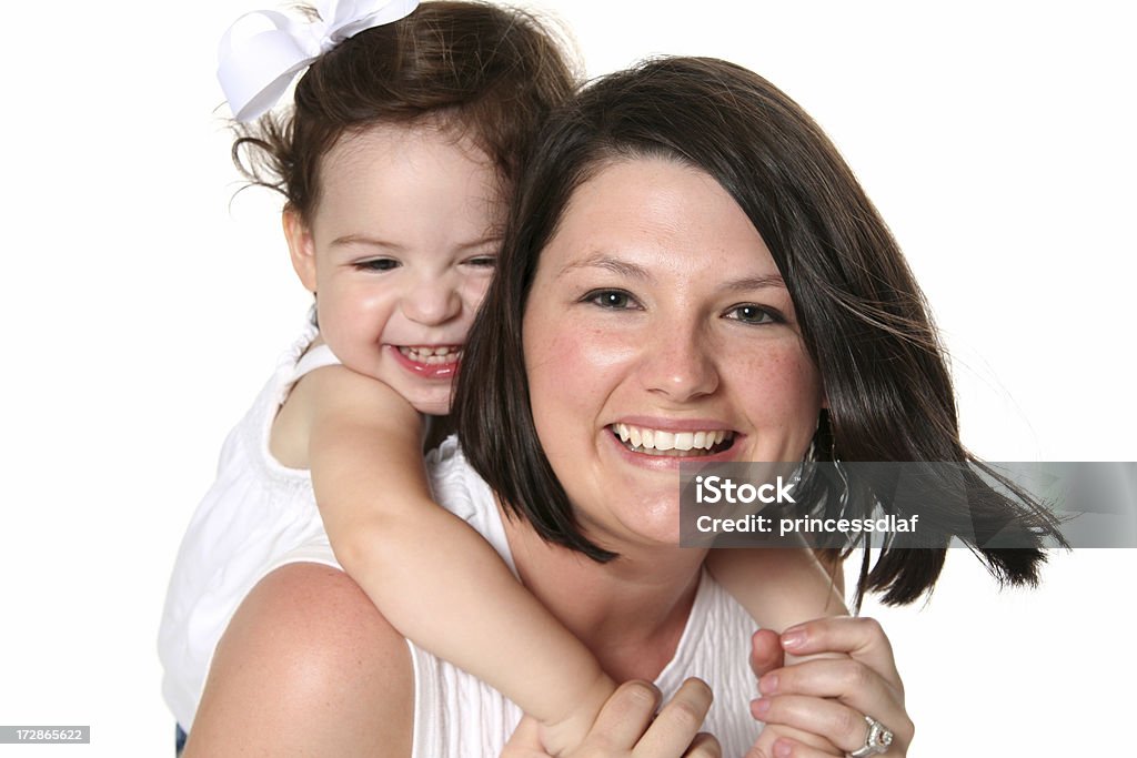 Love My Mommy! Adorable toddler hugging her mommy 2-3 Years Stock Photo