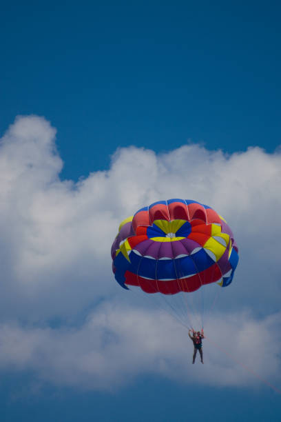 istock Multi coloured parachute over the blue sky 172865824