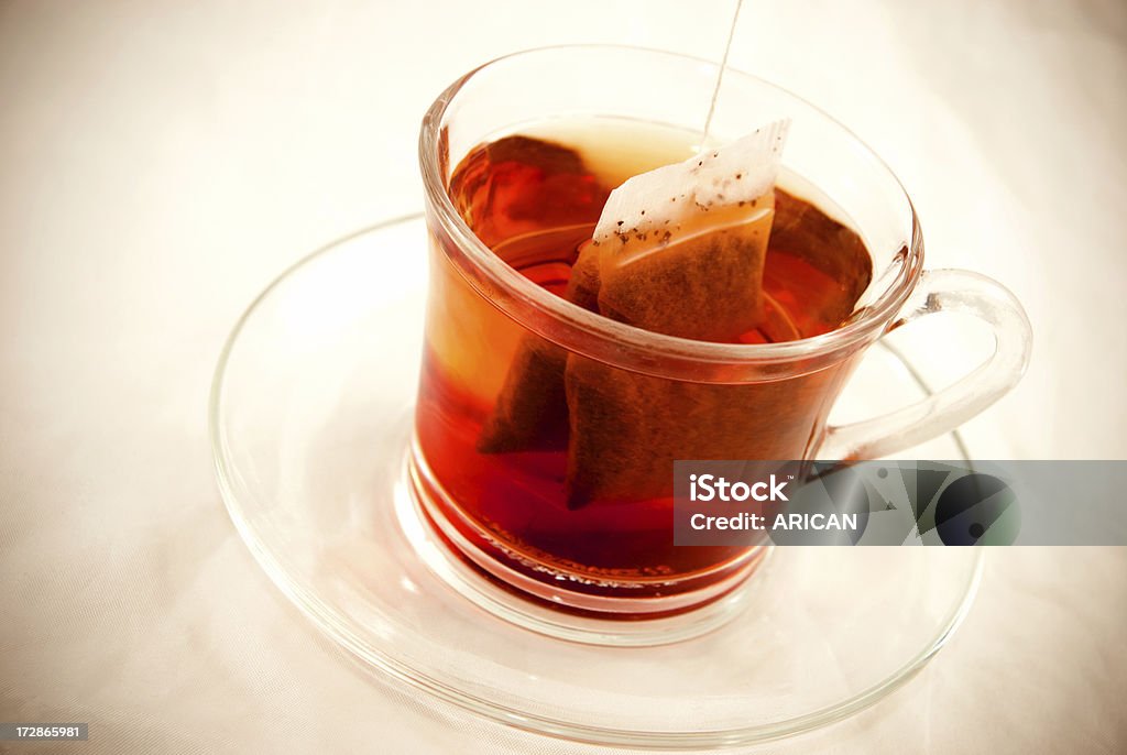 Copa de té con bolsa de extremo - Foto de stock de Té negro libre de derechos