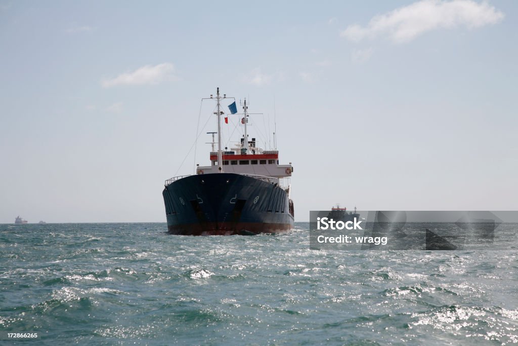 Coastal Cargo Ship Heading for port Business Stock Photo