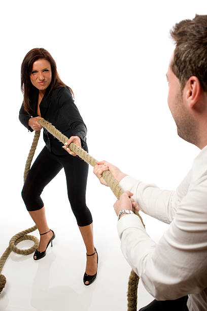 istock Tug-O-War between Man and woman. 172866269