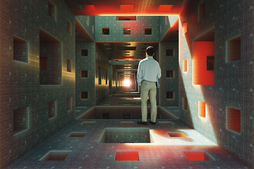 Empty futuristic corridor with businessman standing. 3D generated image.