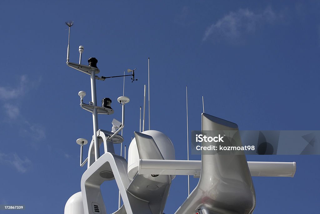 Luxury Yachts Superstructure "Sleek superstructure on a luxury motor yacht showing its sensors for navigation,communication and security." Antenna - Aerial Stock Photo