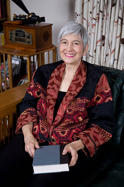 istock Senior Woman Smiling, With Book 172867417
