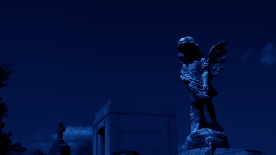 Angel Tombstone at Night