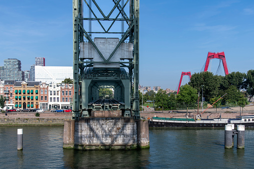 Rotterdam, the Netherlands-September 10, 2023; Old railroad tracks of vertical-lift rail bridge De Hef (the lift) officially Koningshaven Bridge over Koningshaven (Kings Harbor) channel