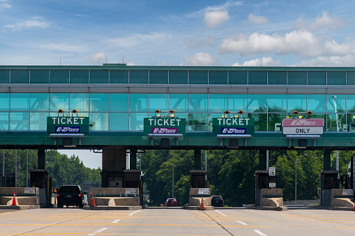 Penns Grove, NJ, USA-July 6, 2023; Drivers perspective of the New Jersey Turnpike toll plaza on I-95 in Northerly direction