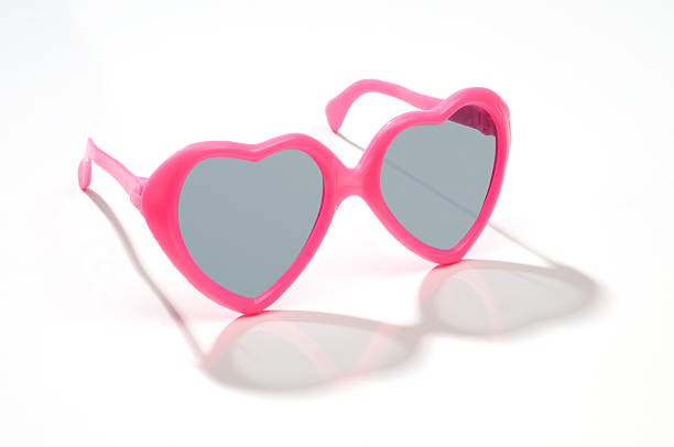 istock Child's pink heart shaped sunglasses-isolated on white 172868323
