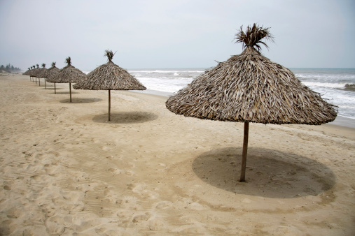 Sunshades at China Beach near Hoi An in Vietnam.