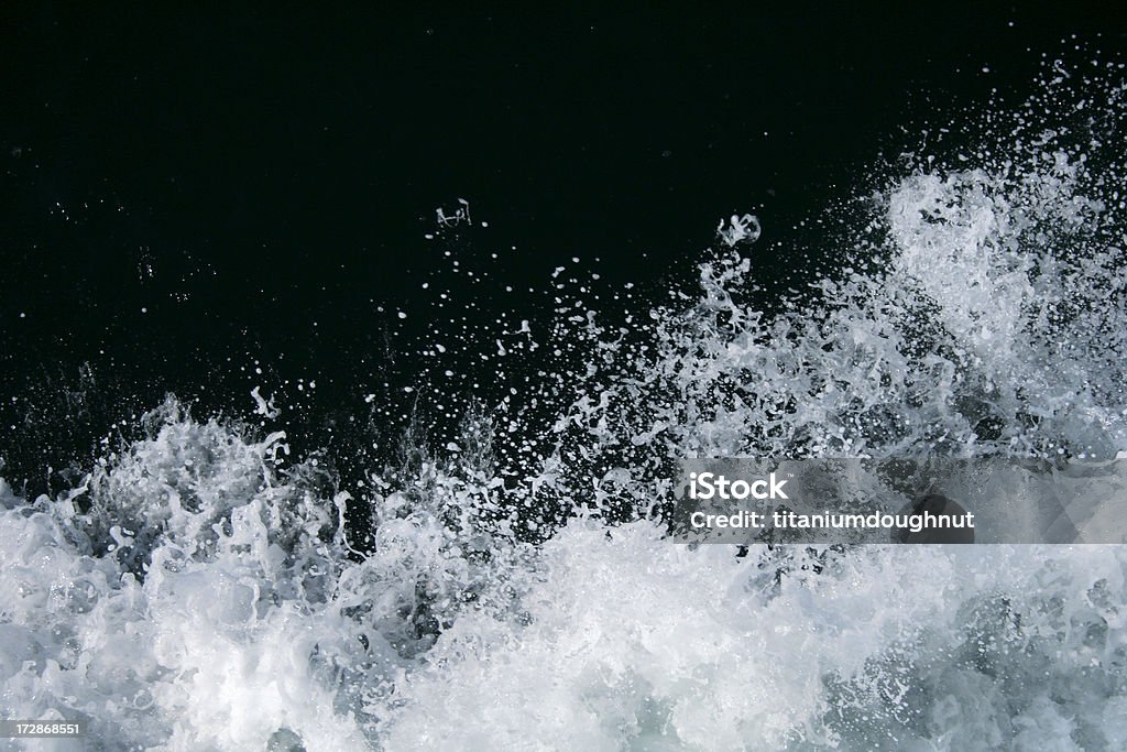 White Spray Intense white water spray against a black background. Perfect for compositing. Spray Stock Photo