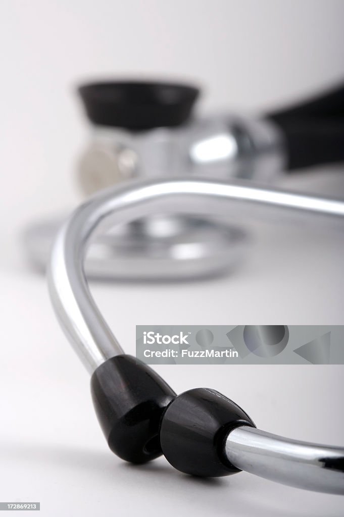 Stetoscopio primo piano - Foto stock royalty-free di Ascoltare