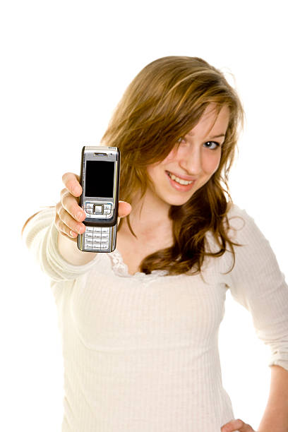 istock Attractive girl showing telephone isolated on white 172871004
