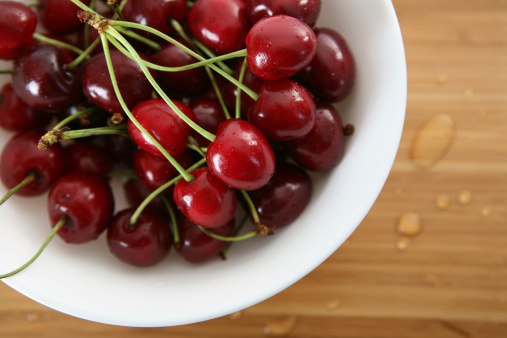 pile of cherries in a bowl