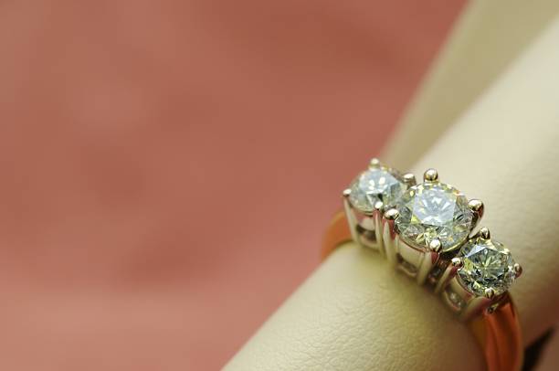 diamond ring, soft dreamy look, focus on middle diamond, copy space