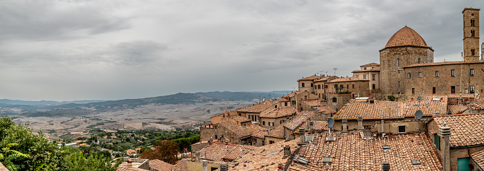Panoramic view of a traditional rooftops houses in Siena Tuscany