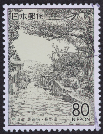 stamp with rural Japanese road.