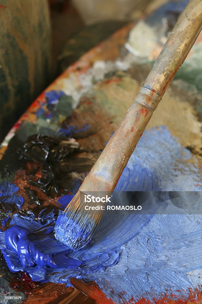 Paintbrush with oil paint on a classical palette Paintbrush with oil paint on a classical paletteCANON 5D- OTHER artists materials related photos: Art Stock Photo