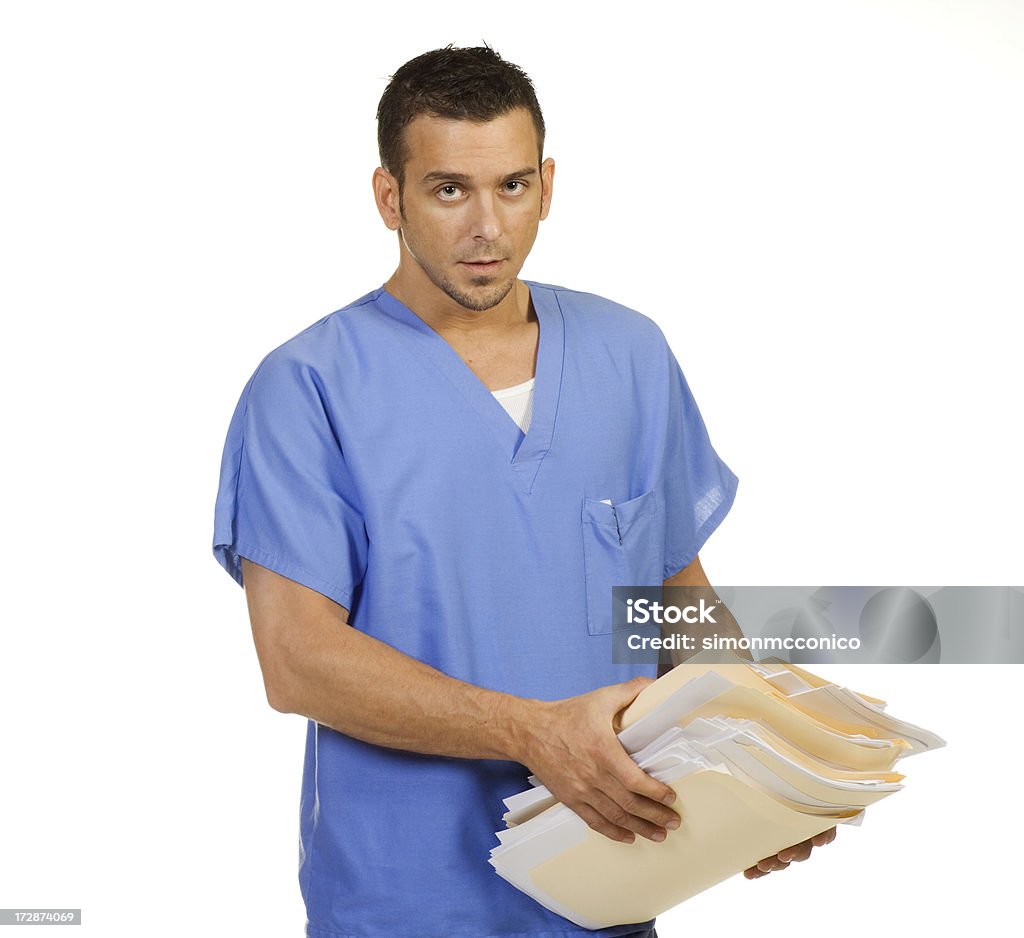 Medical Files A guy holding a ton of files Adult Stock Photo