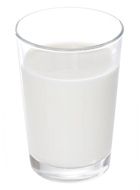 Glass of fresh milk on white background