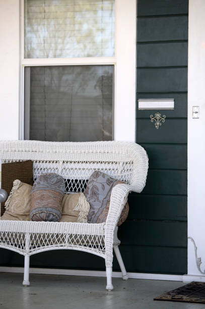istock White wicker chair on an old fashioned porch 172874523