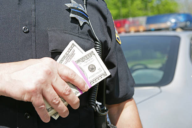 corrupção - police bribe - fotografias e filmes do acervo