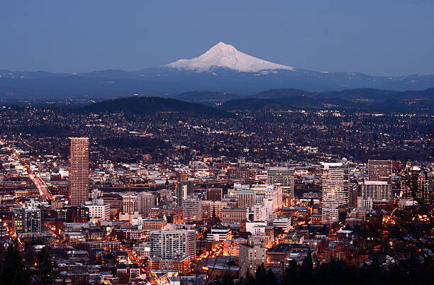 Portland Oregon City lights of Portland with Mt Hood in the distance.Portland Lightbox mt hood photos stock pictures, royalty-free photos & images