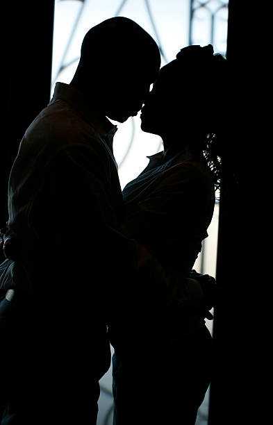 istock Couple Embracing in a Kiss 172875078