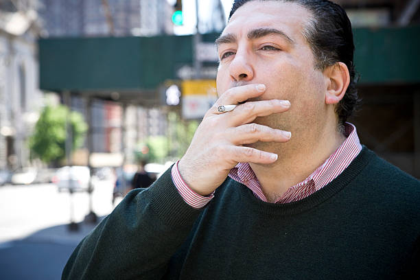 American Italian Man Portrait, Smoking on City Sidewalk, Copy Space stock photo