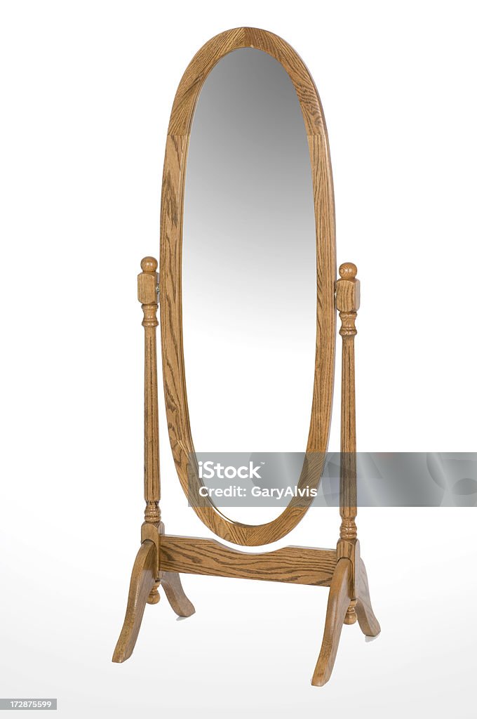 An oval oak full length mirror Oval oak dressing mirror. Free standing on white background. Mirror - Object Stock Photo