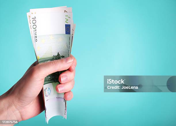 Fistful Of Euros Stock Photo - Download Image Now - Adult, Blue, Business