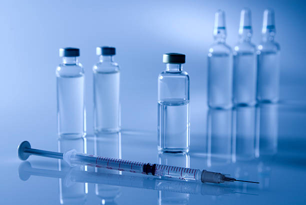 istock Injection needle and glass pots 172875996