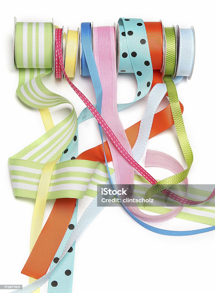 Rolls of Ribbon A mass of vibrant colorful ribbons Anniversary Stock Photo