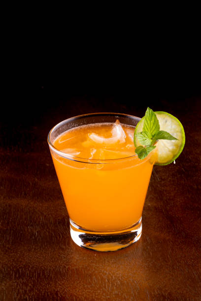 istock orange caipirinha drink glass soda with lemon vodka hifi front from above 1728781817