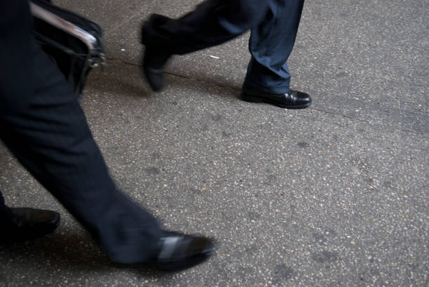 istock Businessman Walk on Gritty Sidewalk 172880714