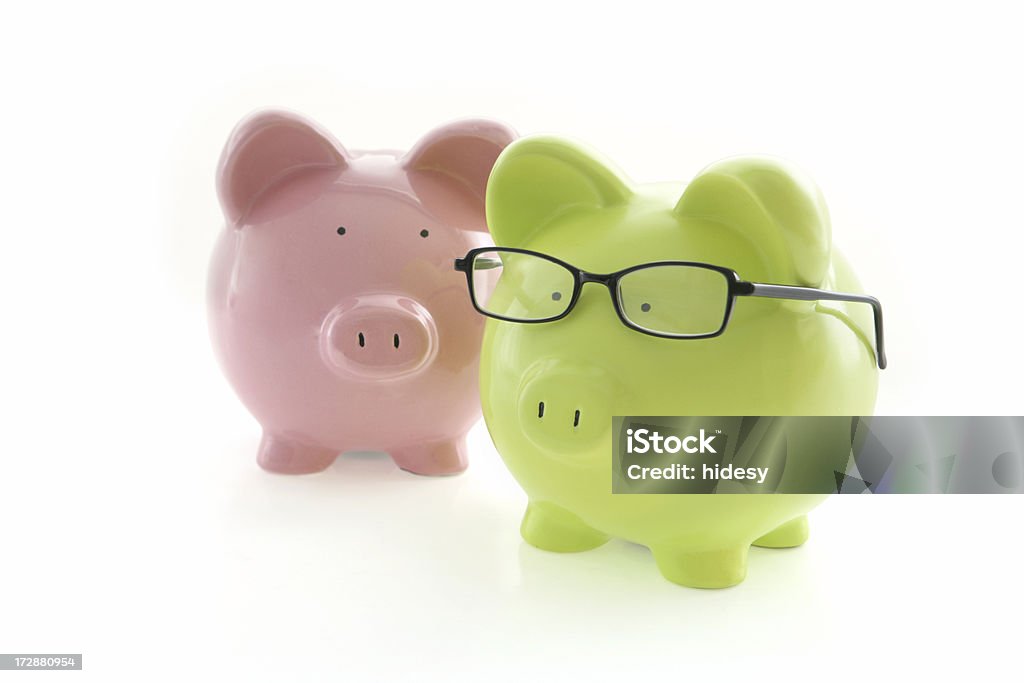 Couple Investments Piggybanks on whiteNo copyright information on piggybank or packaging Piggy Bank Stock Photo