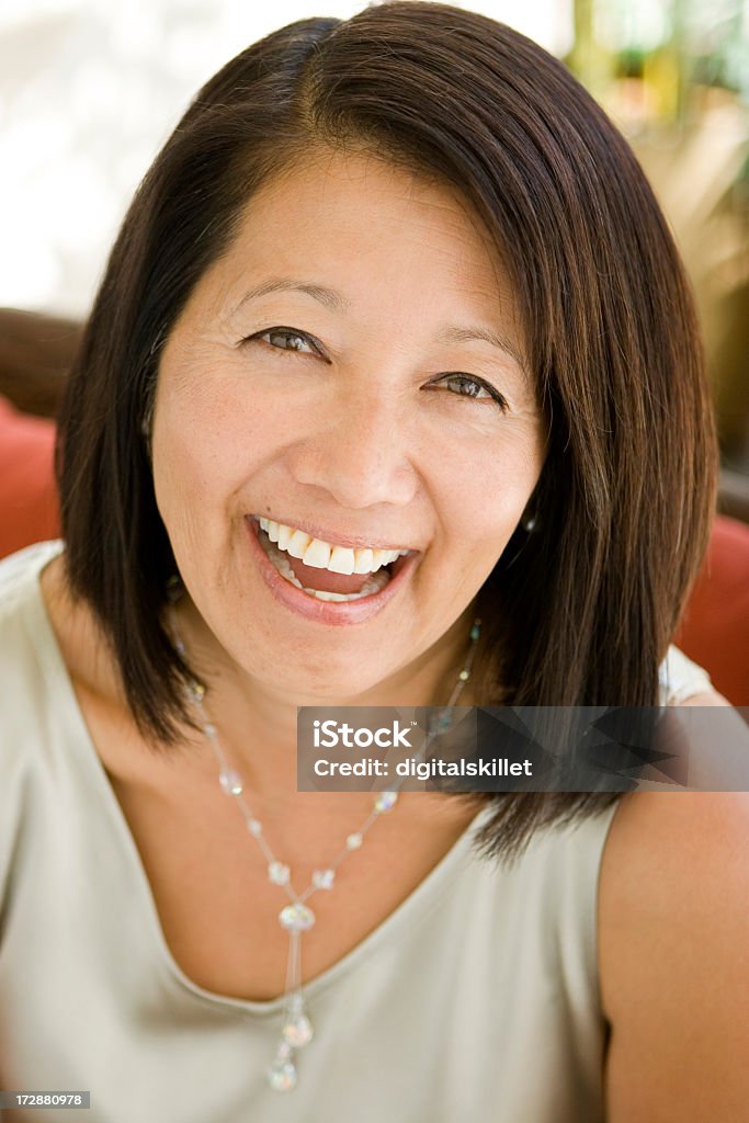 Elegante mujer asiática - Foto de stock de 45-49 años libre de derechos