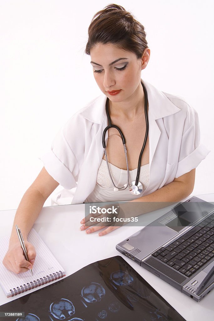 doctor writing Adult Stock Photo