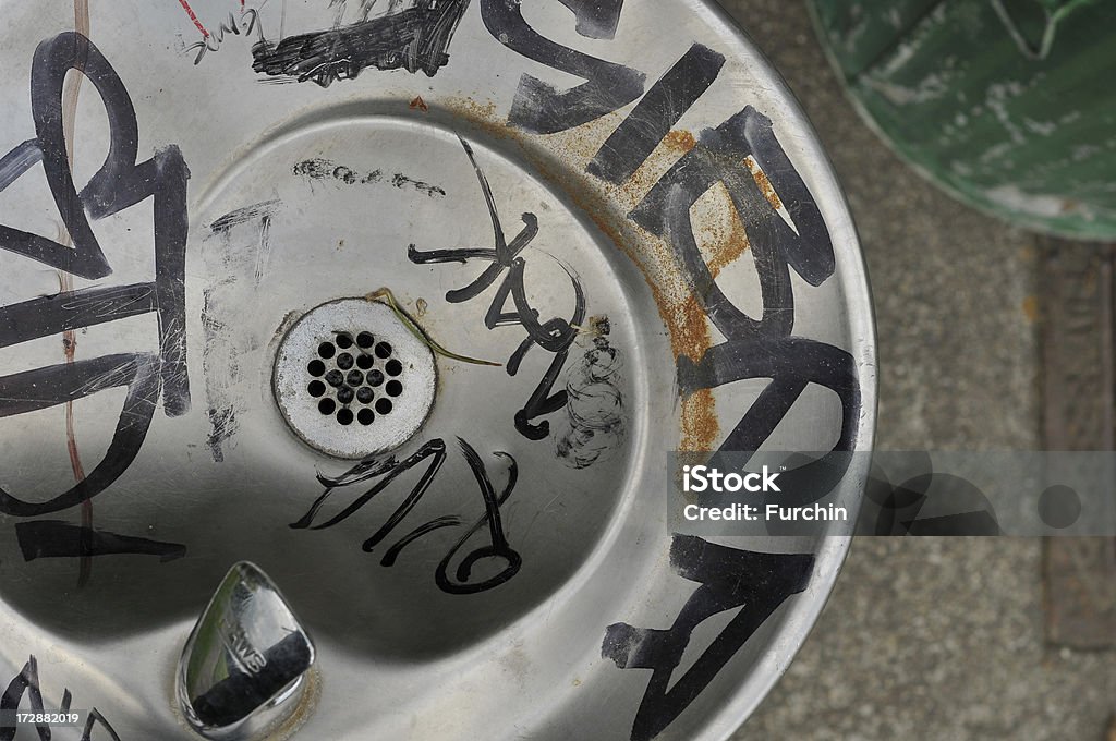 Graffiti Drinking Fountain A water fountain has graffiti. Seattle Stock Photo Graffiti Drinking Fountain A water fountain has graffiti. Seattle Stock Photo