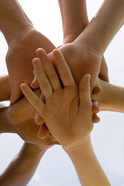 istock Hands Together On Top Of One Another 172882031