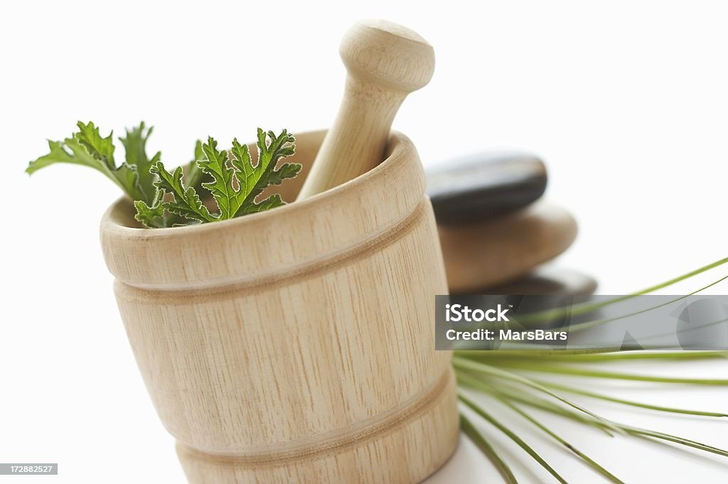 Citronella in spa setting Citronella leaves in a wooden mortar and pestle, in spa setting. You may also like: Alternative Medicine Stock Photo