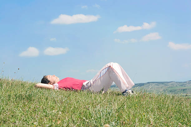 istock Girl relaxing on the meadow 172883105