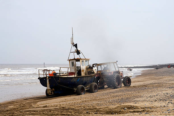 istock Bringing in the boats 172884532