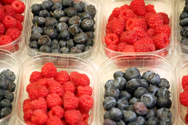 istock Blackberries and raspberries in punnets 172885327