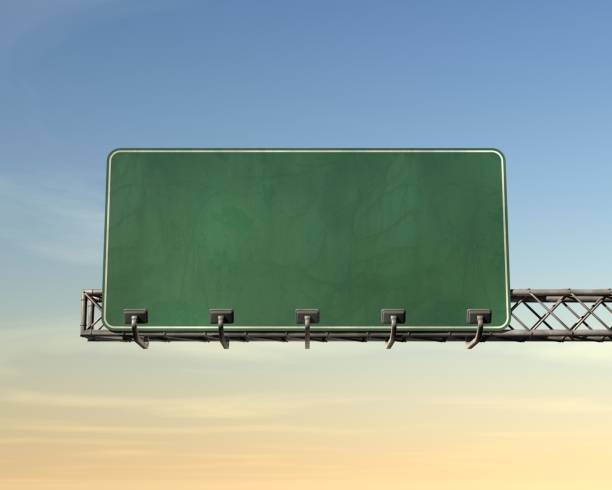 Blank highway sign on a blue sky.This sign contains copy space for your message. I suggest using the Arial font for the interstate look.This is a detailed 3d rendering.